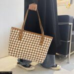 Elevate your style with this imported luxury tote bag, crafted from premium materials for a sophisticated look. Featuring a spacious interior and elegant design, it’s the perfect blend of functionality and fashion for the modern, discerning shopper.